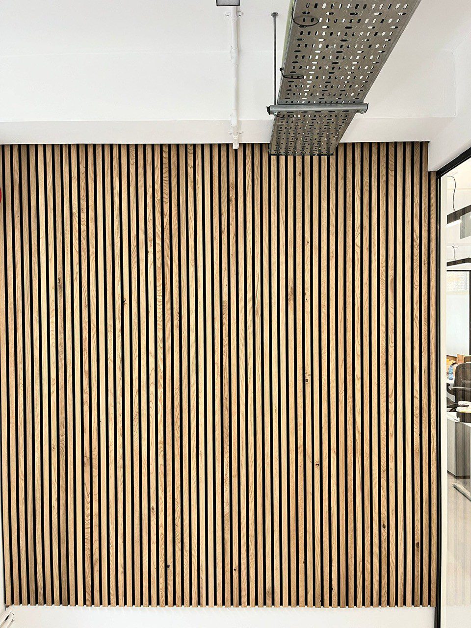 acoustic partition slatted acoustic partition wall in an office
