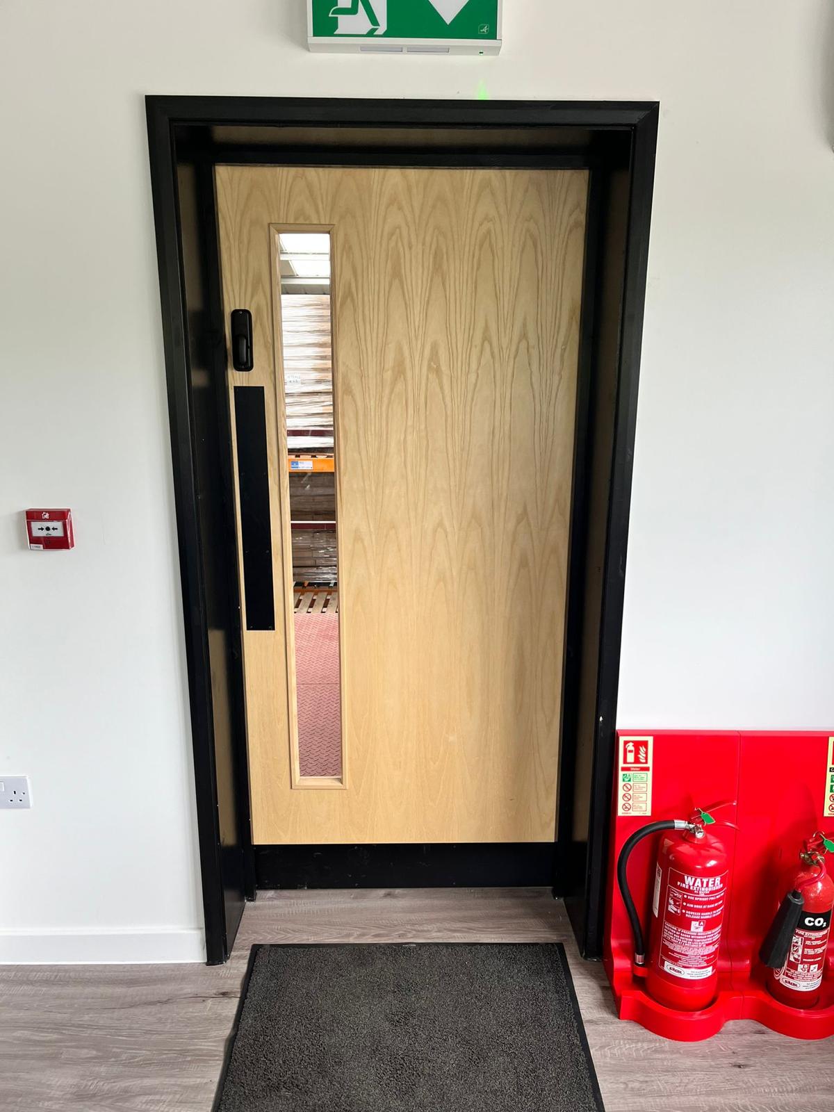 recently installed fire door in a new office